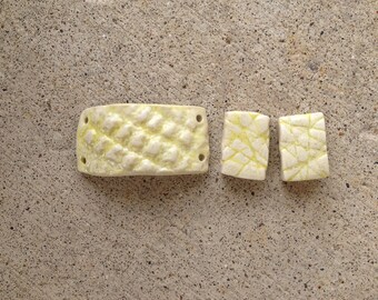 bracelet connector and two beads, kiln fired ceramic, yellow
