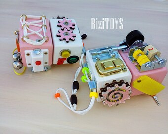 Busy Board Travel Cube. Activity board, early development Montessori educational toy. Busy cube.