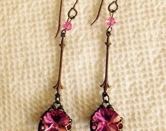 Delicate, drop earrings made with genuine Swarovski crystals