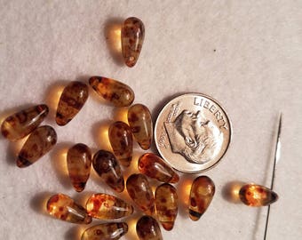 50 6mm Tortoise Teardrop Top String Glass Beads
