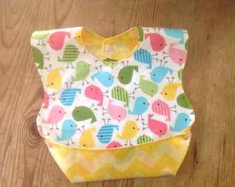 BPA free Laminated Snappy Pocket Bib with Urban Chicks Zoologie by Kaufman with Riley Blake Yellow Chevron, washable, foldable Wipeable