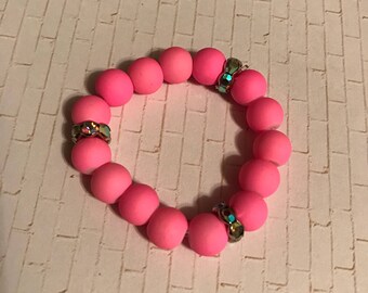 Matte pink and colorful pieces