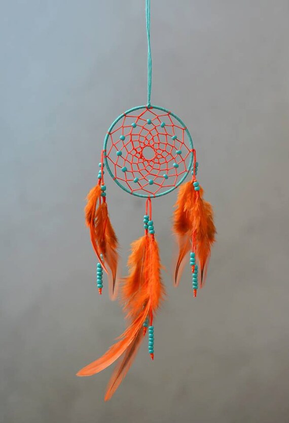 dream catcher with orange and blue beads