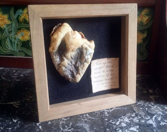 Edgar Allan Poe's "The tell-tale heart" framed heart