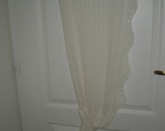 White curtain with hand-made hook