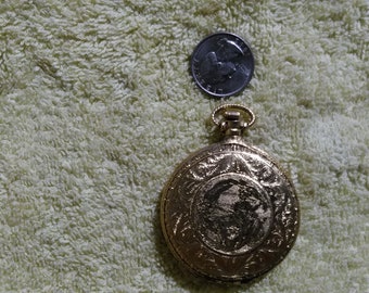 Pocket watch style compact