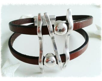 Bracelet leather double straps silver plated parts.