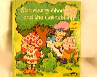 Vintage Strawberry shortcake and the catnabbing popup book