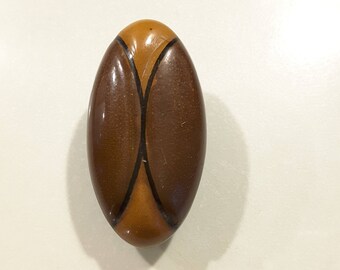 1930's celluloid button.