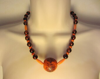 Orange speckled round pendant necklace
