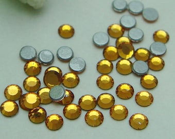 144 pcs swarovski flat back crystal,Topaz (SS5)