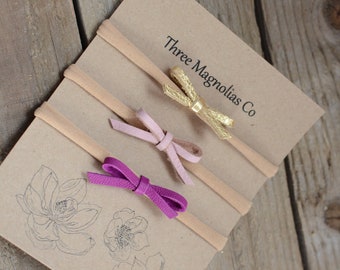Bow set in Magenta, gold, and pink dainty bows