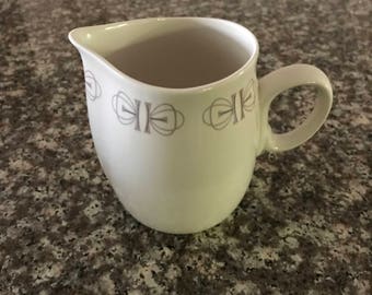 Franciscan “Merry go round” creamer