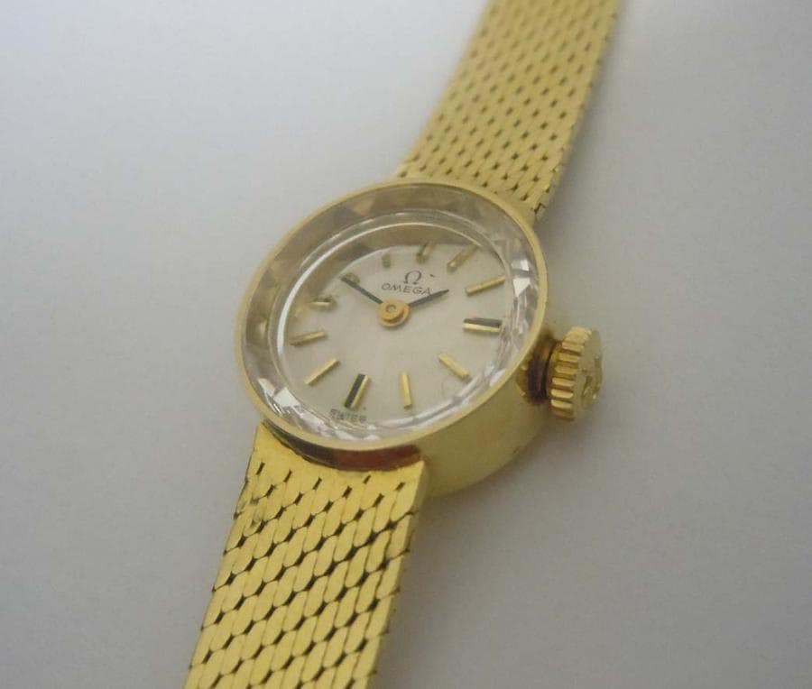 Ladys 14kt Gold Omega Sapphette Silver Stick Dial Dress Watch