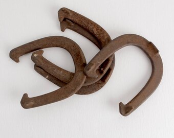 Vintage Set of Four Horseshoes by Royal St. Pierre Worcester, Massachusetts, Rusty Forged Steel
