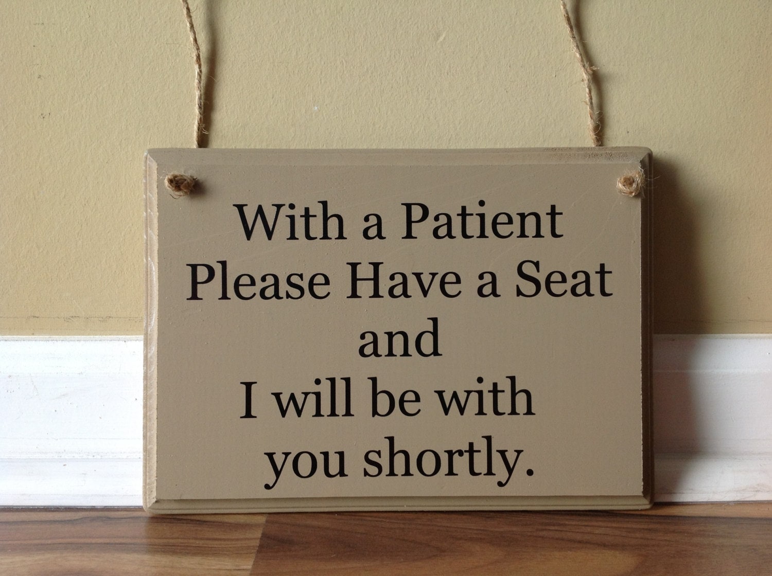 With a Patient please have a seat and I will be with you