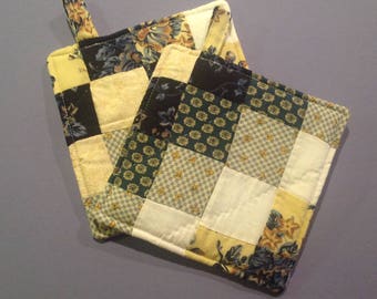 Two potholder set Vintage quilted pillow sham fabric Two quilted pot holders Pot holder