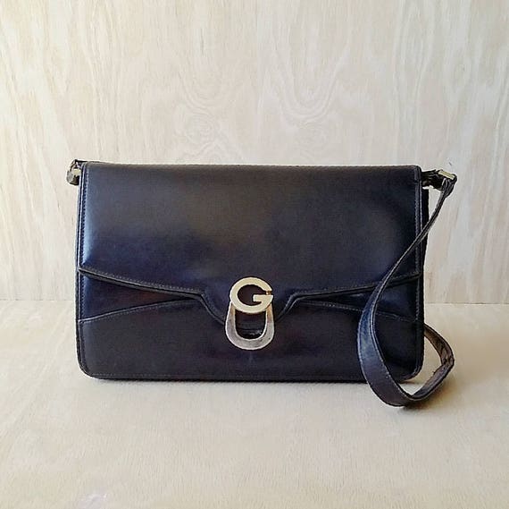 Gucci shoulder bag Black leather Gucci clutch Made in Italy