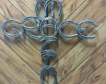 horseshoe cross grace amazing nail