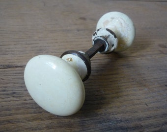 Porcelain door knobs, buttons old door