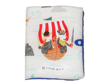 Quilted in matching cotton health booklet