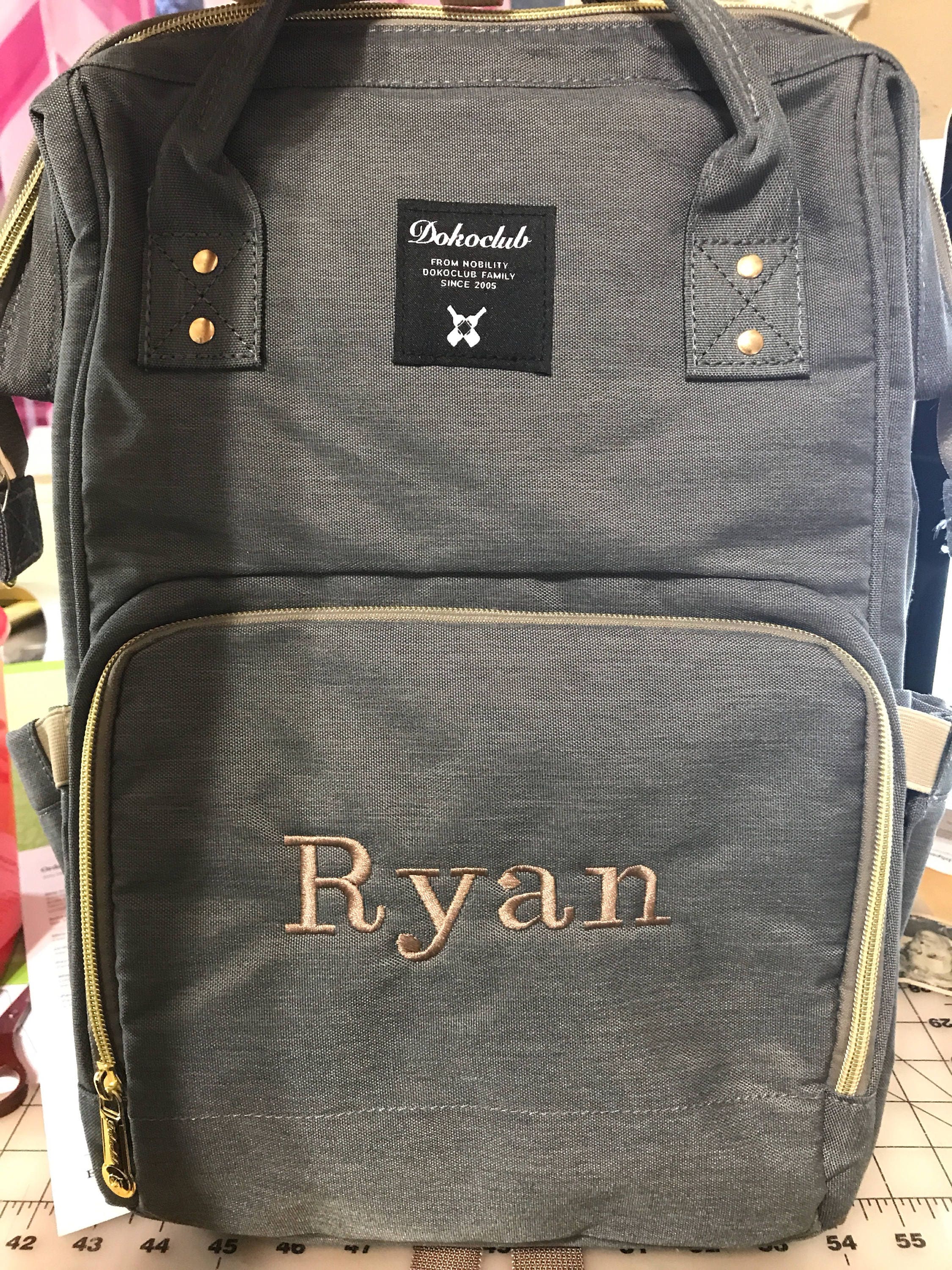 monogram backpack diaper bag