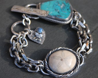 chrysocolla, fossil sand dollar, lapis lazuli, and sterling silver metalwork link bracelet