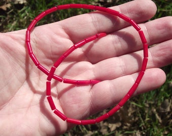 5 BEADS RED CORAL TUBE 9X3MM.