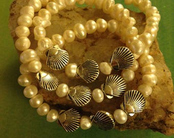 pearl and silver-plated shell bracelets