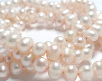 Lt Pink Freshwater Potato Pearls, 6mm Freshwater Potato Pearls. 12 1/2" Strand - 61 Pearls