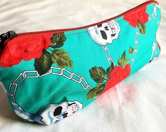 Skull and roses make up bag or pencil case with heart lining