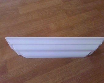 Wall shelf for plates