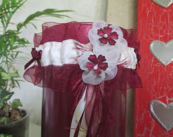 Burgundy and ivory satin garter