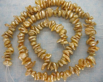 Center Drilled Shampagne Keishi Freshwater Pearls - 15.5 Inch Strand