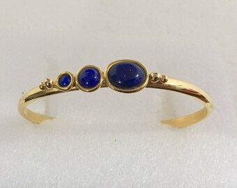 Gold plated brass cuff bracelet with lapis stones