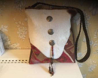 Hair on hide and handwoven Kilim messenger cross body bag