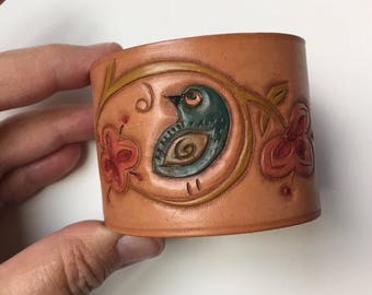 Folk art bird leather cuff