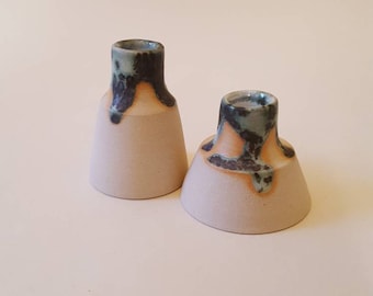 Green and black speckled vases