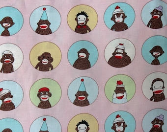 Monkeys'N Round Pink sock monkey fabric