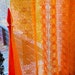 Vintage curtains in orange and yellow pattern. Retro net curtains. Danish modern home decor.