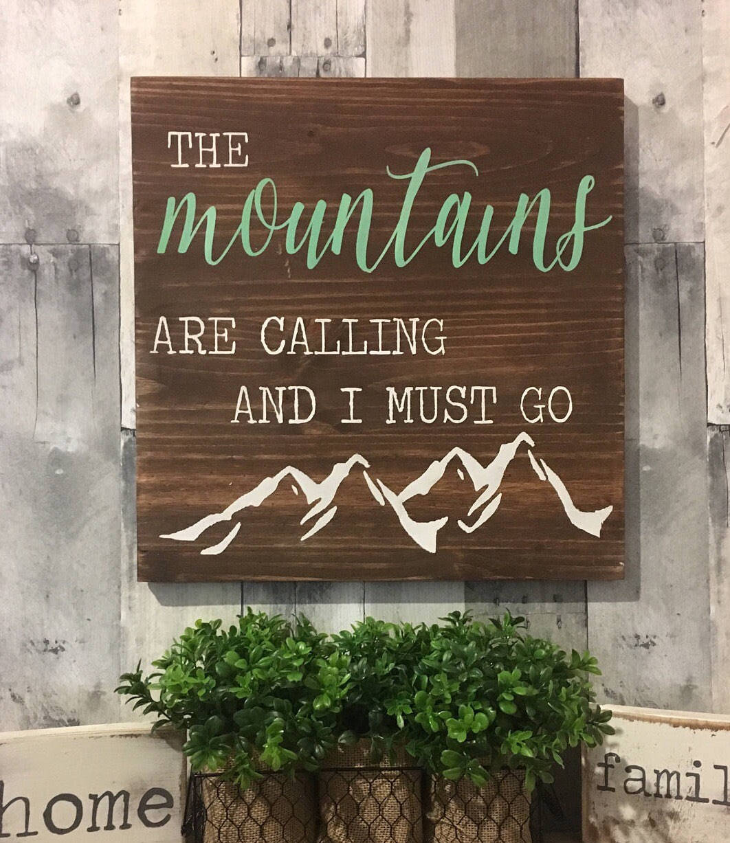 The Mountains are calling sign the Mountains are calling and The Mountains are calling sign the Mountains are calling and