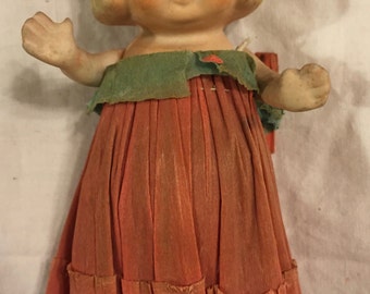 Antique Betty Boop or Kewpie type bisque doll/ original crepe paper dress