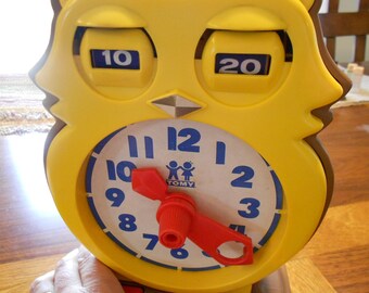 Vintage Tomy learning toy. Clock toy.