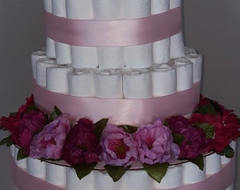 Elegant floral diaper cake in shades of pink. A stunning center piece for any baby shower, the mom-to-be will be ecstatic!