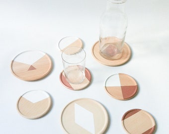 Wooden coasters painted geometric designs