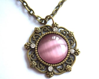 Bronze, antique bronze tone glass pendant necklace pink cateye silver rhinestones