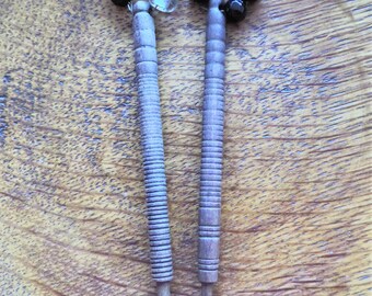 A pair of vintage wooden lace making bobbins with spangles (D)