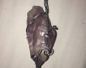 Wire wrapped raw Amethyst gem