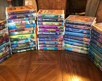 53 Disney vhs tapes/ black diamond / masterpiece 27 lithographs/disney collection lot/Disney