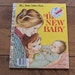 vintage 1975 little golden book The New Baby children girl boy picture book